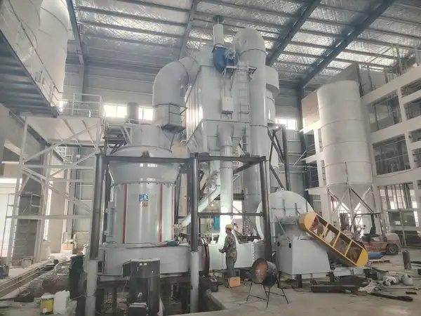 Cronus Machinery technical staff testing the CRRM1920 Raymond mill