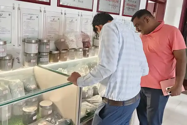 Indian client visiting the powder testing center at Cronus Machinery