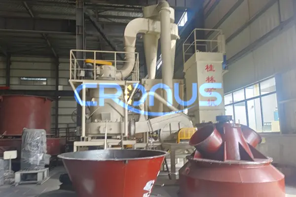 Why do the grinding roller shaft and the central shaft of a Raymond mill need to undergo heat treatm